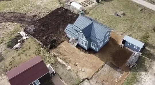 Отсыпка участка вокруг дома